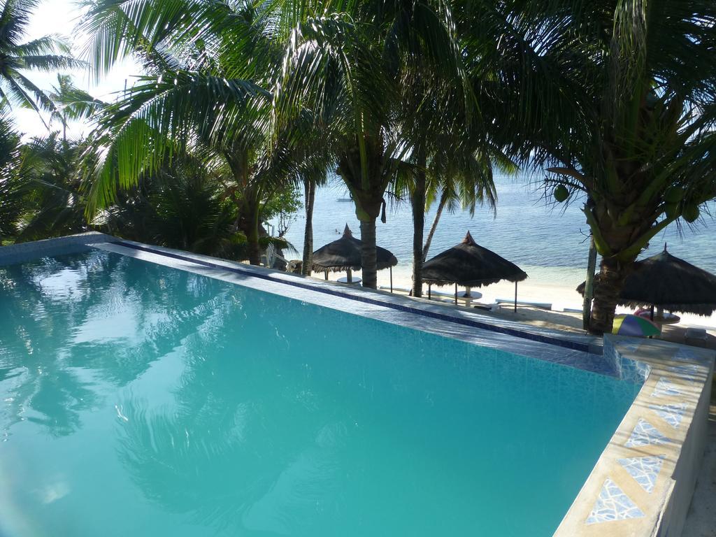 Reddoorz Premium @ Flower Beach Anda Anda  Buitenkant foto